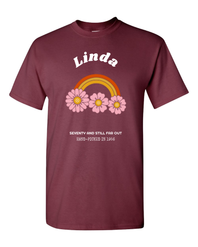 Seventy and Still Far Out on a maroon adult tee